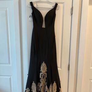 Brand new evening gown never worn.